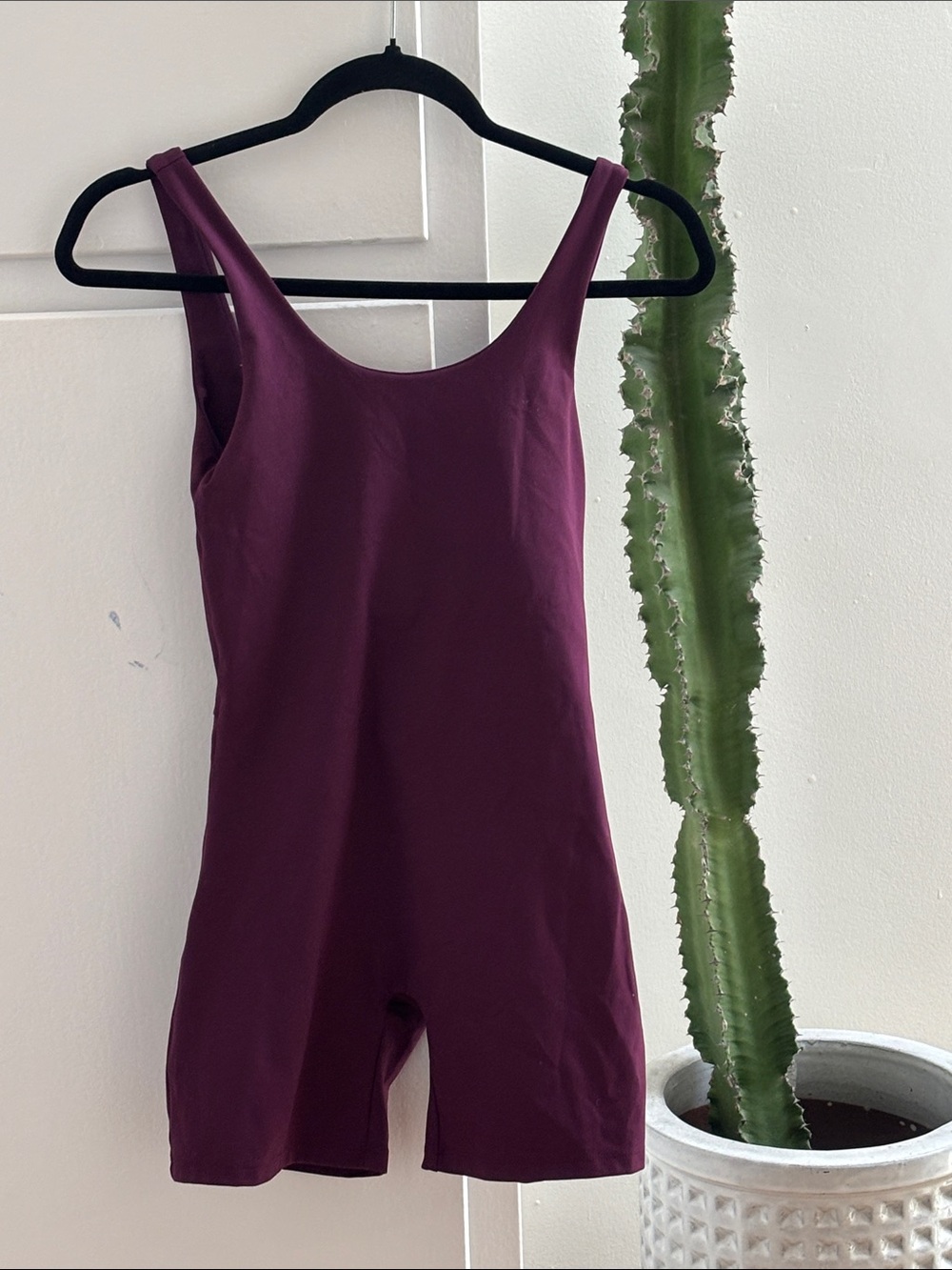 Girlfriend collective maroon unitard  biker shorts set.